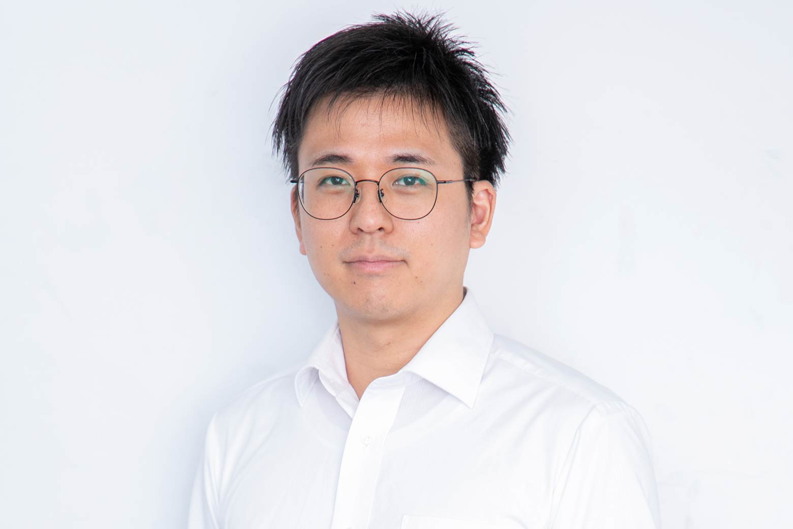 T さん